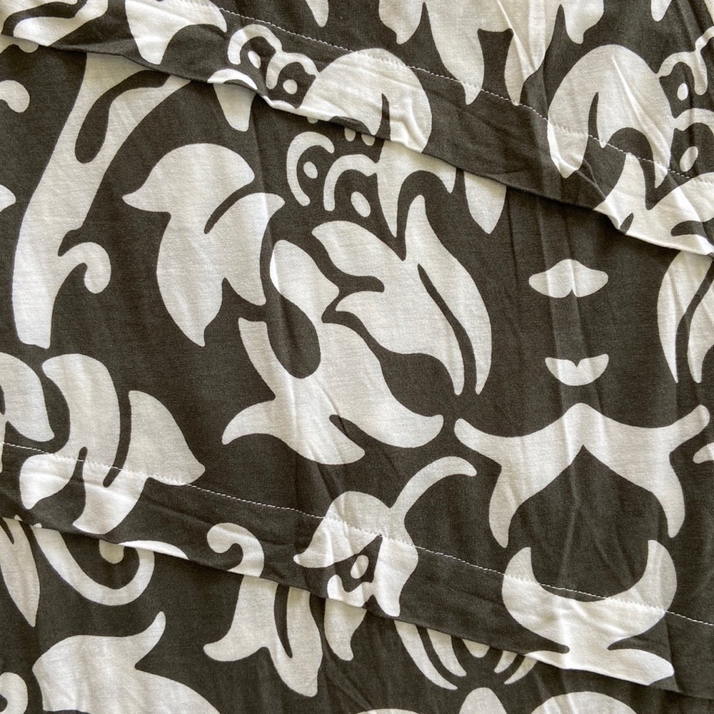 INC a line calf length skirt. Dark gray and white print and 100% rayon - Picture 3 of 3